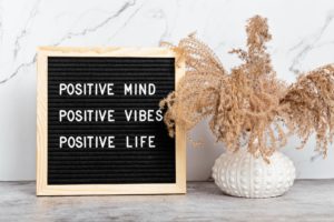 Positive mind, vibes, life motivational quote on the letter board. Inspiration text
